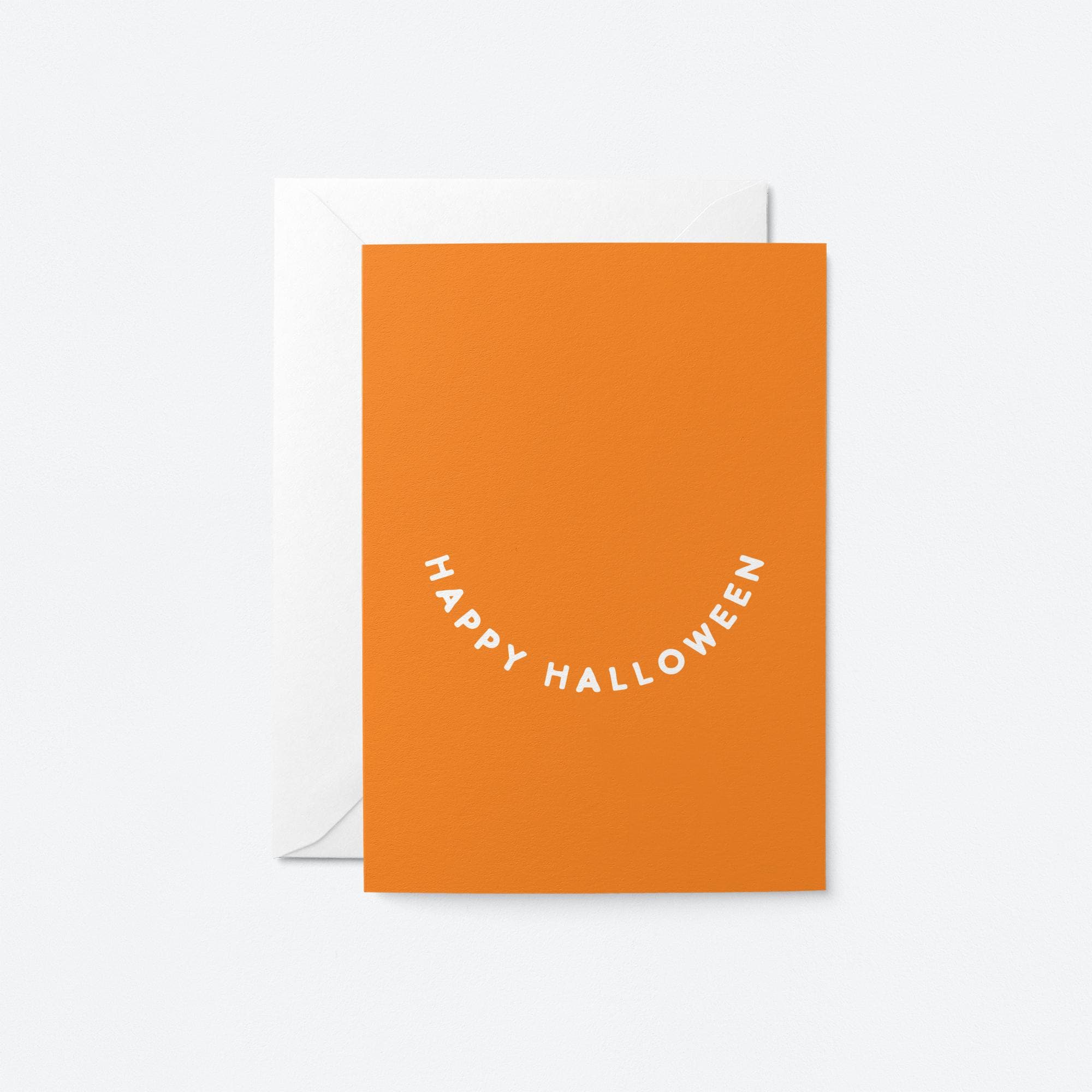 Bright orange Happy Halloween greeting card for festive Halloween wishes with smiley face typography.