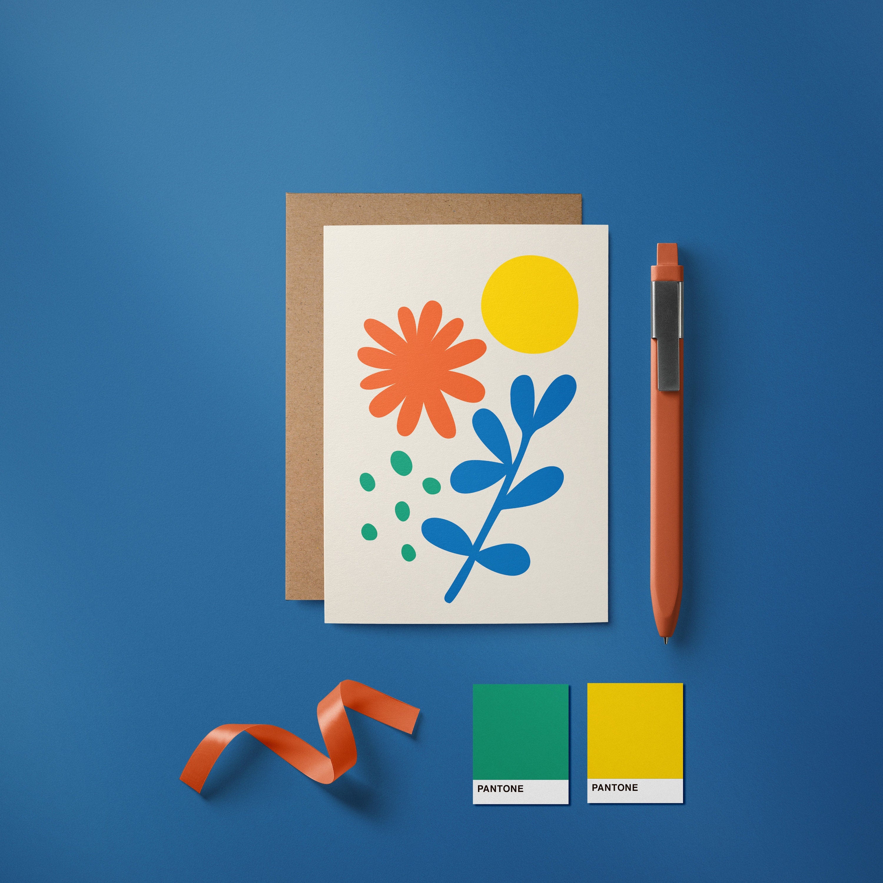 greeting card with red and blue flower, green dots and yellow sun