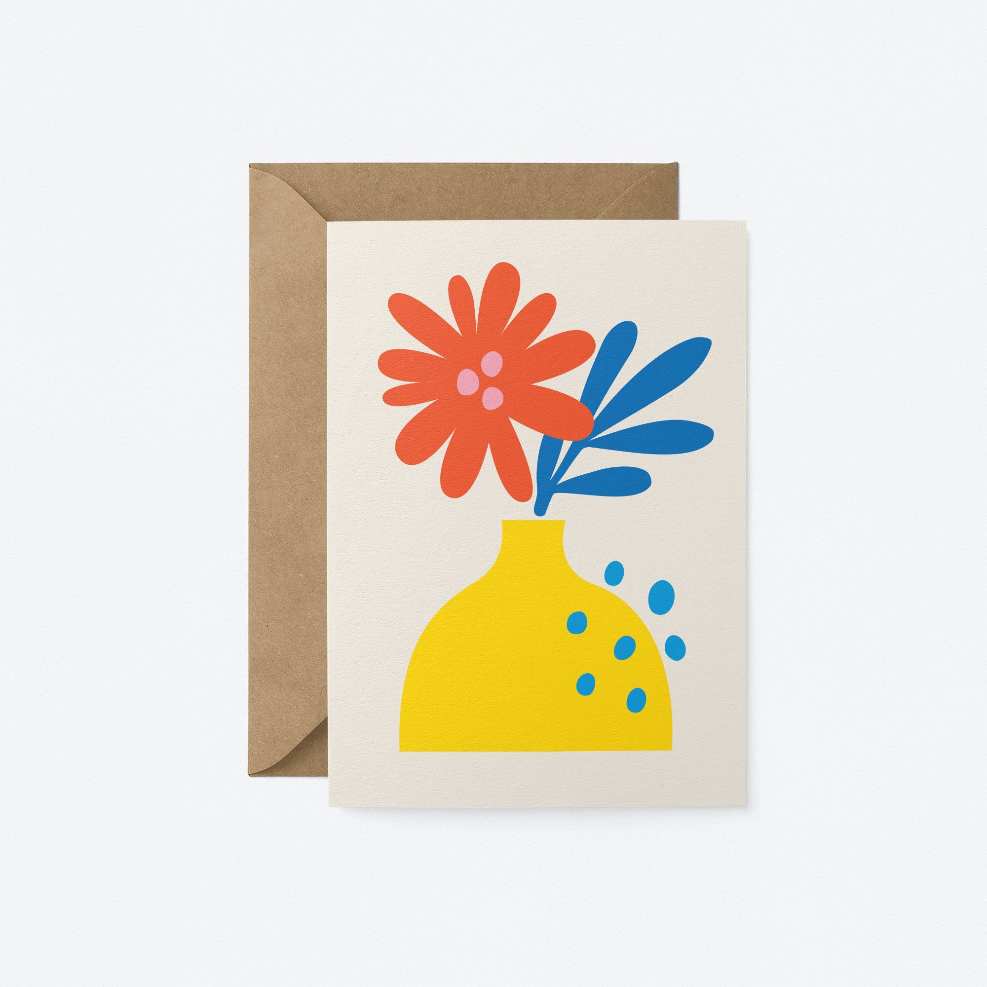 Greeting card with red and blue flowers and yellow vase