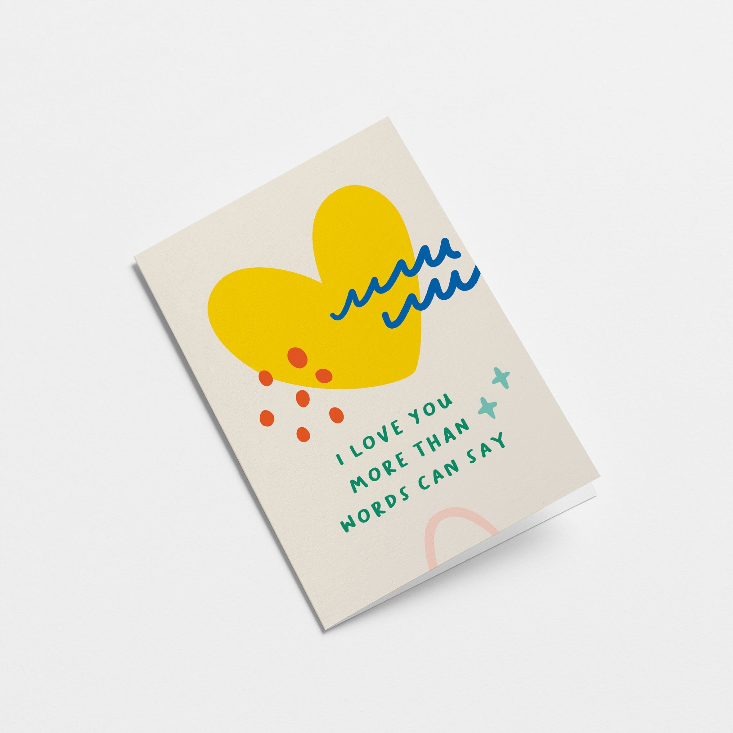 Love card with yellow heart figure, red dots and blue figures with a text that says I love you more than words can say