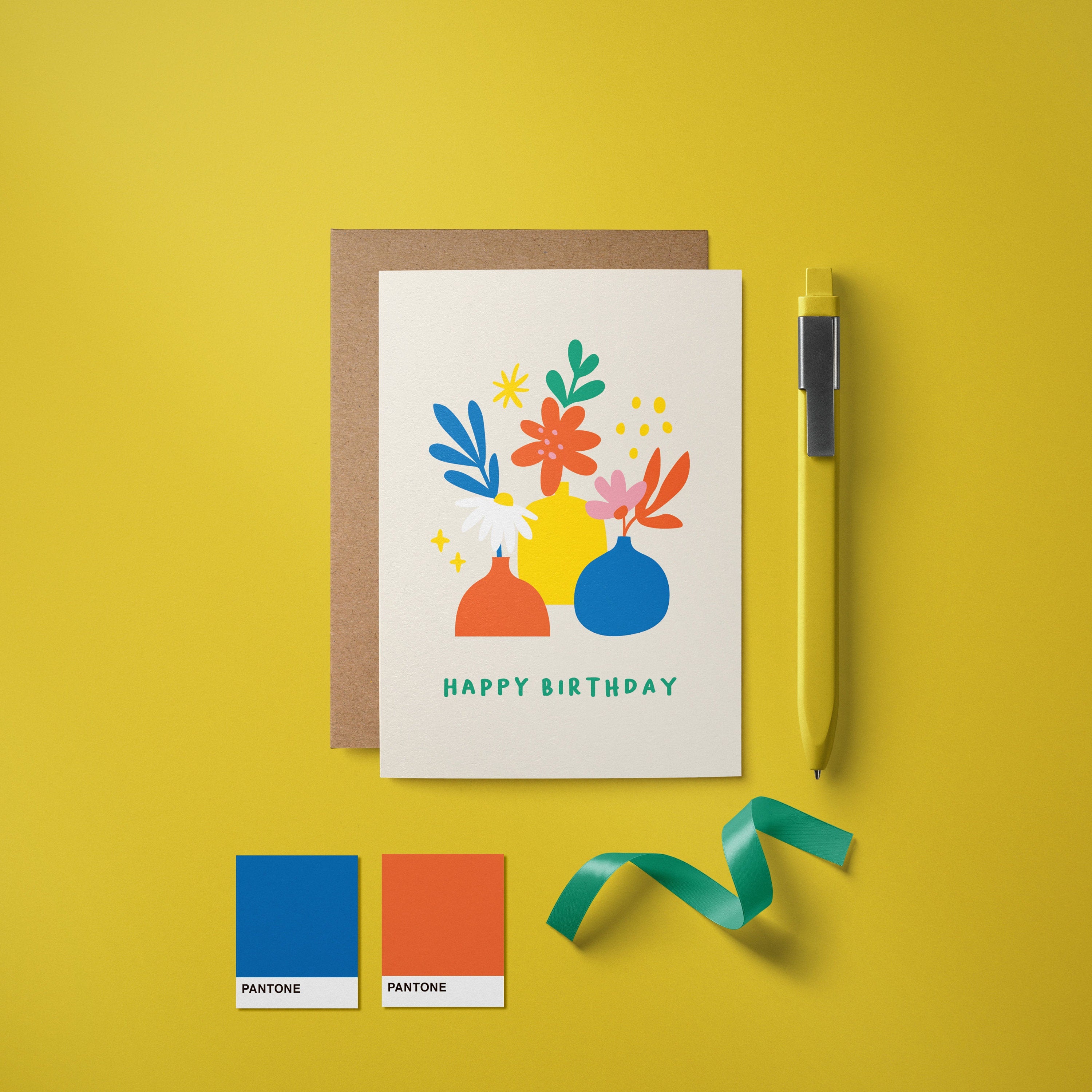 Birthday card with red,blue,yellow,green flowers in red,yellow,blue flowerpots with a text that says happy birthday