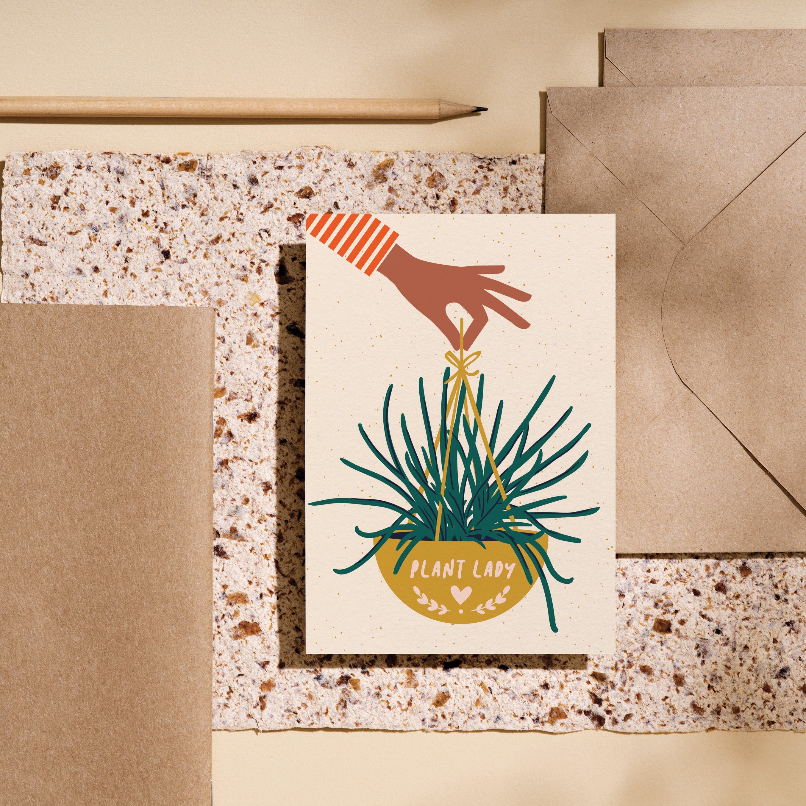 housewarming card with a hand holding yellow plant basket with a text that says plant lady