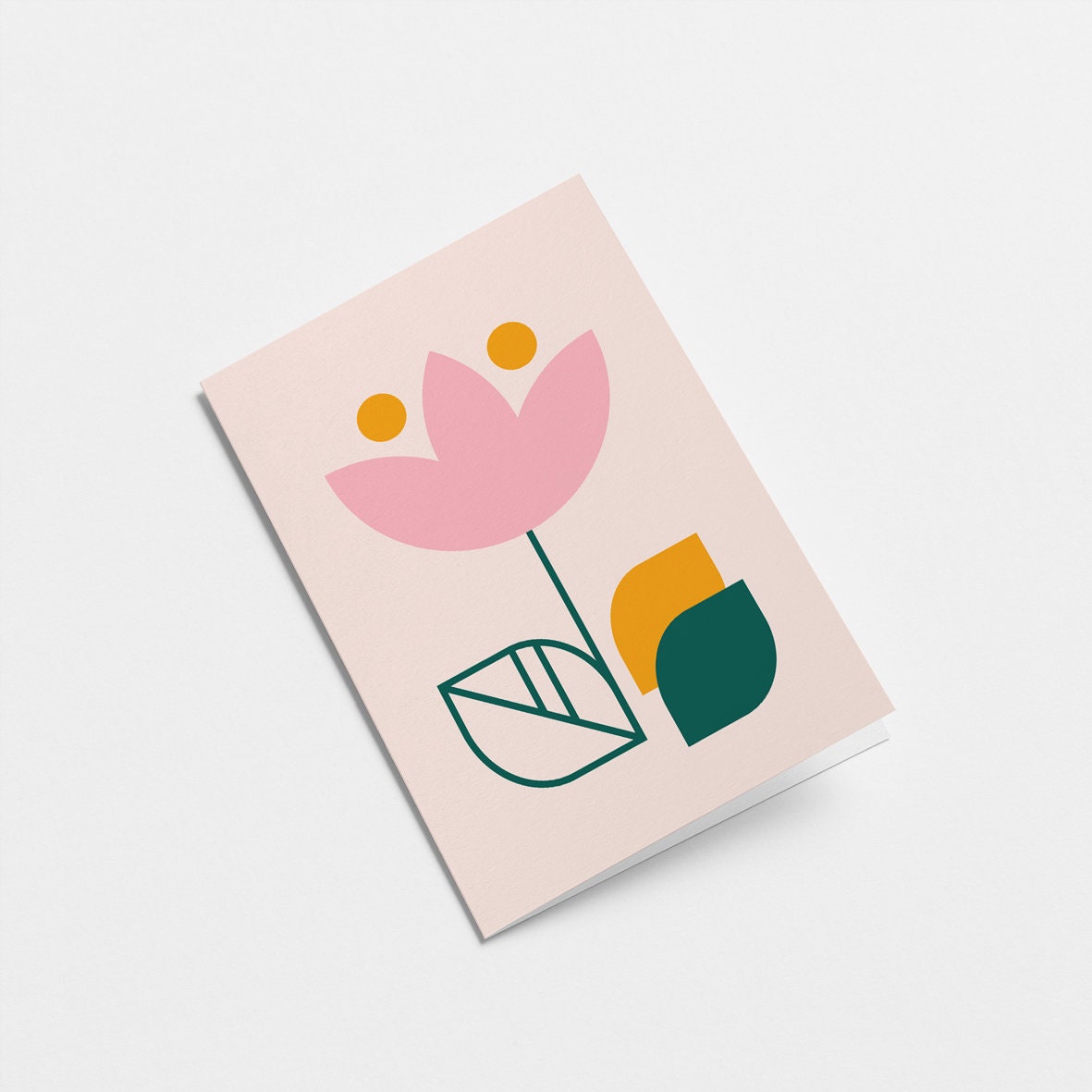 everyday greeting card with a pink flower and yellow, dark green leafs